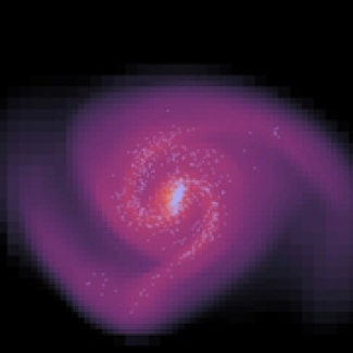 Distribution de la matière 1.5 milliards d'années après le début de la simulation. Les couleurs claires correspondent aux fortes densités de gaz. Les points bleu clair montrent des étoiles jeunes. 